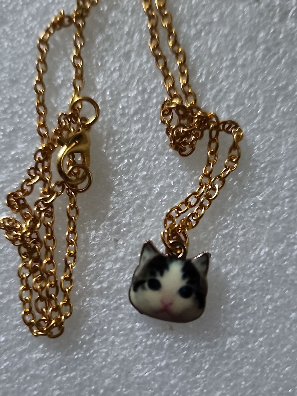 Hand Crafted Gold-tone Cat Face Necklace with White and Black Enamel